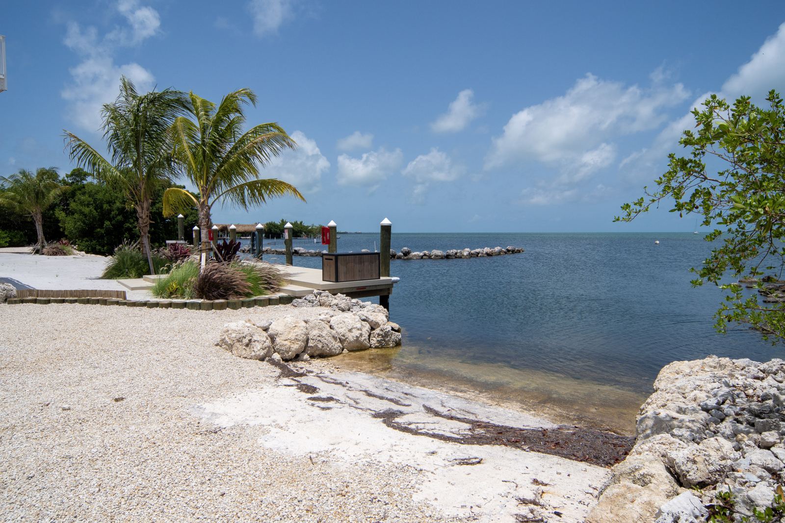 Private beach and dock on the Gulf at Dolphin Cove