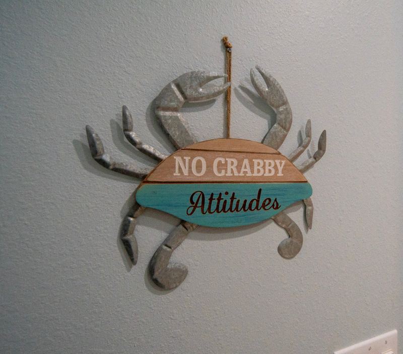 A “No Crabby Attitudes” crab sign