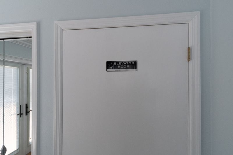 Door to the private elevator beside the full bedroom