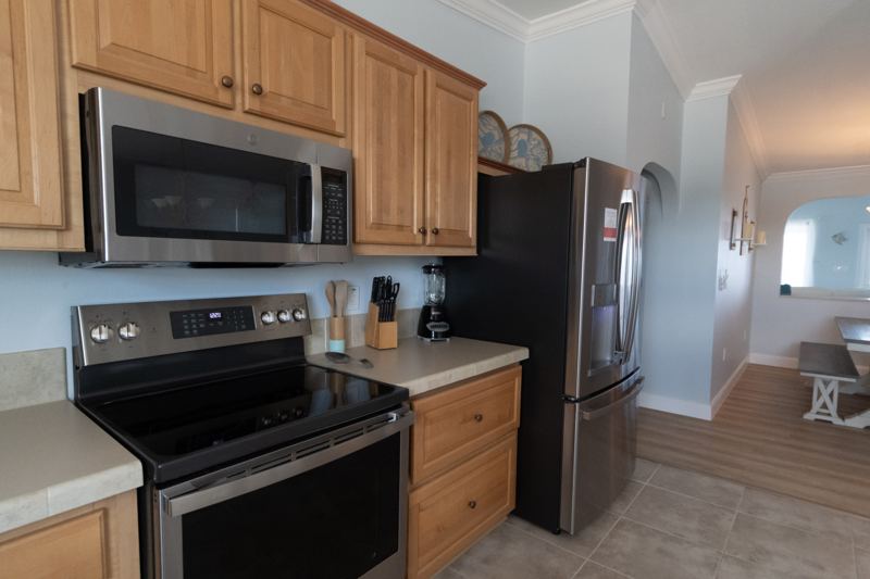 Stainless steel range, microwave and refrigerator
