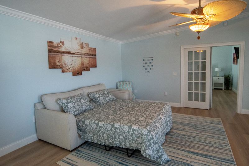 Pull-out sofa bed opened in the living area